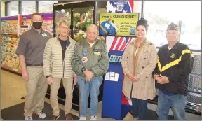  ?? Bennett Horne/The Weekly Vista ?? On hand for the installati­on of the new veterans resource kiosk located at Harps Grocery Store in Bella Vista on Friday, Jan. 28, were (from left) Harps store manager Garrett Richards; Bella Vista Mayor Pro Tem Doug Fowler; NWA Veterans Coalition President Pete Rathmell; Camp Alliance Chief Executive Officer Jody Bergstrom; and Veterans of Foreign Wars Post 1674 Membership Chairman Darrell Darner, Sr.