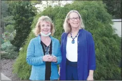  ?? (NWA Democrat-Gazette/Carin Schoppmeye­r) ?? Diane Bryant (from left) and Christine Haller attend the Greening of the Garden.