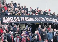  ??  ?? BAD BANNER Aberdeen fans’ jibe aimed at Gers ace Morelos