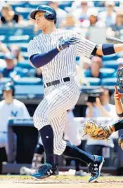  ?? JIM MCISAAC/GETTY IMAGES ?? Yankees rookie outfielder Aaron Judge leads Major League Baseball in home runs with 30.