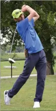  ?? Sierra Bush/Herald-Leader ?? Jonathan Self, Course at Sager’s Crossing manager, follows through after hitting a ball off hole five. Self and his father moved to the area about three months ago to begin restoring the Siloam Springs golf course.