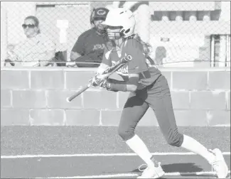  ?? Fred Conley • Times-Herald ?? Palestine-Wheatley's Presley Reeves moves up in the batter's box, attempting a drag bunt in Friday's game against England.