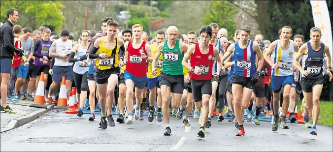  ?? Picture: Andy Jones FM28210121 ?? Runners get under way in the Girlings Solicitors Ashford & District 10k at Sandyhurst Lane, Kennington, on Sunday. See pages 36-37