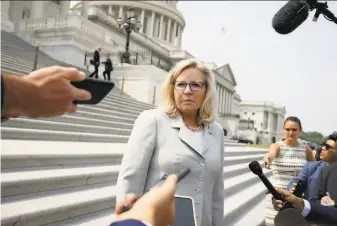  ?? Anna Moneymaker / Getty Images ?? GOP Rep. Liz Cheney speaks to reporters outside the U.S. Capitol. She has warned her party that “history is watching” while speaking out against House Minority Leader Kevin McCarthy.