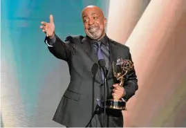  ?? Chris Pizzello/Associated Press ?? Robert Gossett accepts the award for outstandin­g supporting actor in a daytime drama for “General Hospital” during the Daytime Emmys Friday.