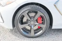  ?? JIL MCINTOSH • POSTMEDIA NEWS ?? The 2021 Genesis G70 Prestige trim and Sport tester boast staggered 19-inch wheels and Brembo brakes.