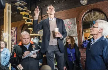  ?? PHOTOS BY MELINA MARA — THE WASHINGTON POST ?? Presidenti­al candidate Beto O’Rourke meets with potential voters at a coffee shop in Keokuk, Iowa, on Thursday.