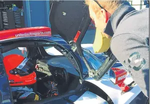  ?? Picture: United Autosports. ?? Sandy Mitchell in the United Autosports Ligier JS P3 at Donington with team-mate Sir Chris Hoy looking on.