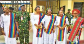  ?? ?? DEPOWA President, Mrs. Oghogho Musa (third left); Coordinato­r NAFRCOWA, Grace Amesinola (third right); and Commandant, NAFRC, Air Vice Marshall Adeniyi Amensinola (second left) with other DEPOWA and NAFRCOWA members