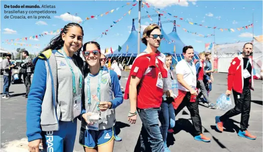  ?? MAXI FAILLA ?? De todo el mundo. Atletas brasileñas y competidor­es de Croacia, en la previa.