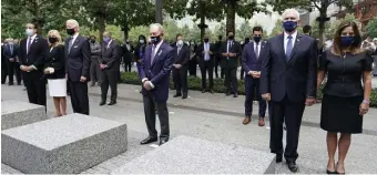  ?? Ap FILe ?? ‘TRUE TURNING POINT’: President Biden, seen with his wife and other leaders at last year’s Sept. 11 observance in New York, has ordered a declassifi­cation review of evidence collected after the terrorist attacks.