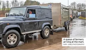  ?? GARY JONES PHOTOGRAPH­Y ?? A queue of farmers arrving at the mart.