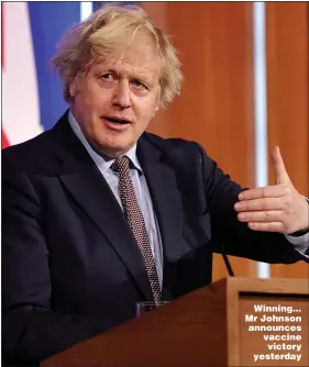  ??  ?? Winning... Mr Johnson announces vaccine victory yesterday