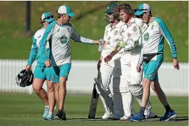  ?? GETTY IMAGES ?? Will Pucovski is helped from the field after suffering his latest concussion when struck on the helmet playing for Australia A last month.