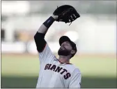  ?? NHAT V. MEYER — BAY AREA NEWS GROUP, 2020 ?? The San Francisco Giants’ Brandon Belt makes a catch for an out in the first inning at Oracle Park on July 30.