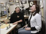  ?? GARY REYES — STAFF ARCHIVES ?? Longtime hosts Gary Scott Thomas and Julie Stevens work the microphone during their daily morning show at KRTY in San Jose in 2010. The station's frequency has been sold.