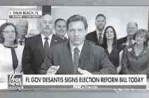  ?? Fox News ?? Gov. DeSantis signed the state Legislatur­e’s Draconian election bill into law on Fox News.