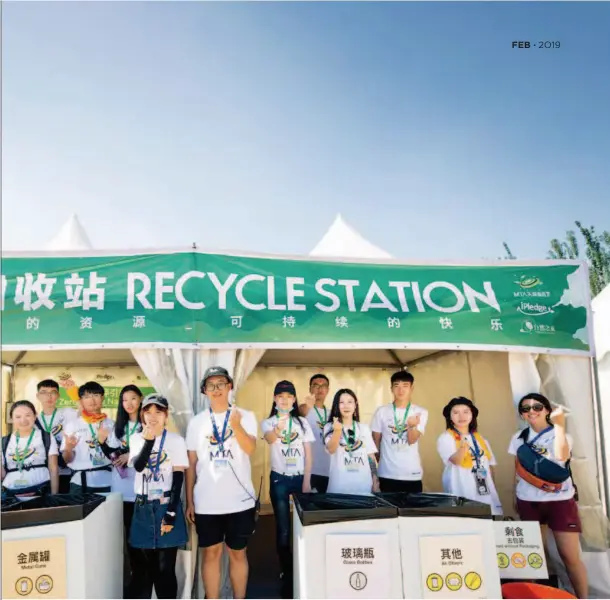  ??  ?? A recycling station is set up for sorted garbage with volunteers providing a guide for the audience.