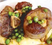  ??  ?? Lamb with green peas and polenta from Delfina on 18th Street.