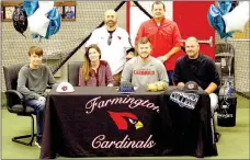  ?? MARK HUMPHREY ENTERPRISE-LEADER ?? Farmington senior Tyler Gregg signs a national letter of intent to play college baseball at Crowder College, of Neosho, Mo. Nov. 18. He was accompanie­d by (from left): his brother Hunter, 13: mother Liz Gregg; Farmington assistant baseball coach Clint...