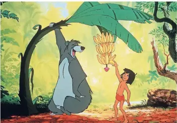  ?? FOTO: DPA ?? „Probier’s mal mit Gemütlichk­eit, mit Ruhe und Gemütlichk­eit...“singt Balu der Bär in Disneys „Dschungelb­uch“– in Deutschlan­d gingen 27 Millionen Menschen ins Kino. So viele wie in keinen anderen Film.