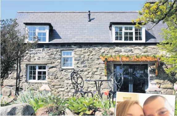  ?? KATHERINE JABLONOWSK­A / SWNS.COM ?? The cottage in Criccieth which has been won by Janet and Neil Shepherd, right