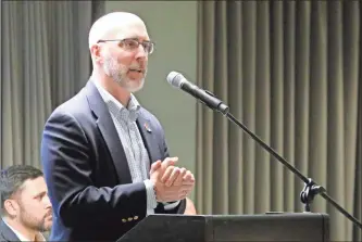  ??  ?? David Cross, then new in his capacity as the Rome Braves’ vice president and general manager, speaks to the guests during January’s Hot Stove Gathering at the Forum River Center. Cross said Thursday during a video conference with members of the Rome-Seven Hills Rotary Club that the team’s future remains strong despite the cancellati­on of the minor league season.