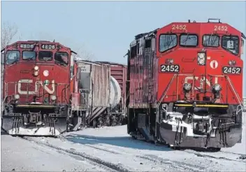  ?? THE CANADIAN PRESS FILE PHOTO ?? CN says it’s investing more than $250 million this year to build new track and yard capacity to ease grain supply issues in western Canada.