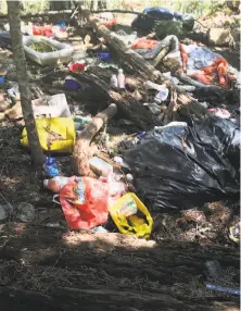  ?? Lauren Horwood / U.S. attorney’s office ?? A photo provided by the U.S. attorney’s office shows trash at an illegal marijuana grow site near Hayfork (Trinity County).