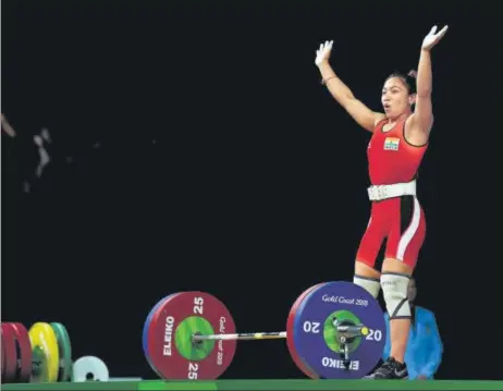  ?? GETTY IMAGES ?? Mirabai Chanu bettered her national record by lifting a total of 203kg in the 49kg category at the National Championsh­ips in Kolkata on Tuesday. n