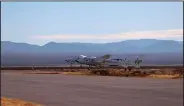  ?? (AP/Virgin Galactic) ?? Virgin Galactic’s SpaceShip Two Unity, attached to a carrier jet, takes off Saturday in southern New Mexico.