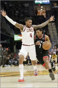  ?? TONY DEJAK — THE ASSOCIATED PRESS ?? Toronto’s Kyle Lowry (7) drives past Cleveland’s Kevin Porter Jr. (4) on Thursday. The Raptors won, 115-109.