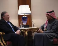 ?? (Andrew Caballero-Reynolds/Reuters) ?? US SECRETARY OF STATE Mike Pompeo talks with Mohammed bin Abdulrahma­n bin Jassim Al Thani, the Qatari deputy prime minister and foreign affairs minister, at the Sheraton Grand in Doha yesterday.