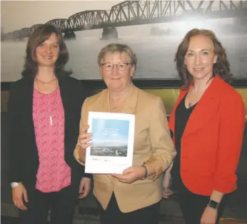  ?? CITIZEN STAFF PHOTO ?? Julia Good, Teresa Saunders and Catherine Pennington released the local report called Vital Signs Prince George, Telling Our Story Friday that is a snapshot of the community on Friday.