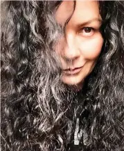  ?? ?? In a tangle: Hollywood star Catherine Zeta-Jones gives in to the curls