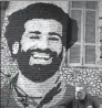  ??  ?? A mural of Mohamed Salah adorns a Cairo wall
