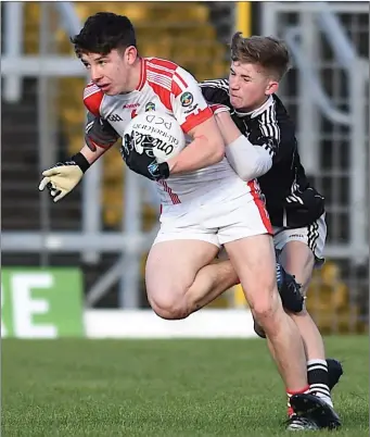  ??  ?? Gearóid Ó Leidhinn, PS Chorca Dhuibhne, getting away from Sean Andrews, St Francis, in the Corn Uí Mhuirí semi-final at Fitzgerald Stadium on Saturday. Photo by Michelle Cooper Galvin