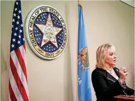  ?? [PHOTO BY DOUG HOKE, THE OKLAHOMAN] ?? Gov. Mary Fallin discusses executive orders she signed during a news conference Nov. 21 at the Capitol.
