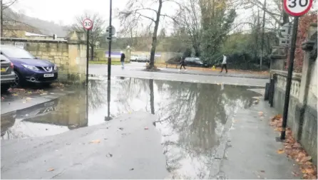  ??  ?? Reader M Gross’s photograph of the flooding caused at the bottom of the junction of Pulteney Road and Lime Grove. See letter - ‘Clear these leaves to end flooding threat’