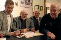  ?? PHOTO: SVEN HERSELMAN/FAIRFAX NZ ?? Marlboroug­h Heritage trustee Peter Scott, left, incoming Marlboroug­h Historical Society president Ren Wagenvoort, trust chairman Dale Webb and trustee Graeme Gilmore sign the deed transferri­ng the assets of the society to the trust.