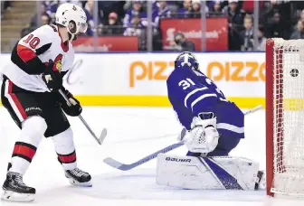 ??  ?? Ottawa’s Tom Pyatt beats Leafs goalie Frederik Andersen with 3:05 to play Wednesday in Toronto.