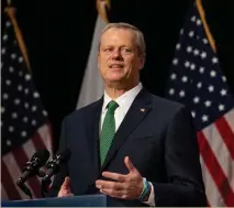  ?? Herald Pool PHoto ?? SIGH OF RELIEF: Gov. Charlie Baker said Tuesday the coronaviru­s surge in Massachuse­tts is ‘behind us.’