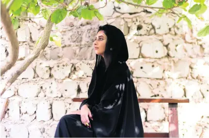  ?? Reem Mohammed / The National ?? Abaya designer Alia bin Omair has witnessed the changing fabrics and colours used to create abayas.