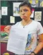  ?? HT PHOTO ?? ▪ Acid attack fighter Rupa at Sheroes Hangout, Agra, with a copy of the letter she wrote to the PM.