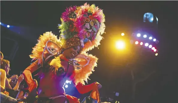  ?? Ramon Espinosa/the associated press ?? A Tropicana cabaret dancer performs during the closing of an internatio­nal tourism fair in Havana.