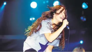  ?? MICK HUTSON GETTY IMAGES ?? Alanis Morissette performing at the T in the Park Festival in Scotland in 1996.