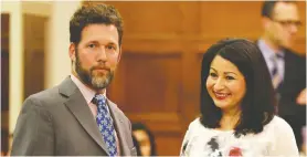  ?? JULIE OLIVER/FILES ?? Then-democratic institutio­ns minister Maryam Monsef chats with Conservati­ve MP Scott Reid before a meeting of the Commons Committee on Electoral Reform in 2016. The Liberals balked at following up on the committee’s work.