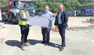  ?? Site manager, Krol Corlett Constructi­on, Asa Munro; West Lancs Borough Council leader Cllr Ian Moran; and director of Krol Corlett Constructi­on, Simon Krol, at the Skelmersda­le site ??