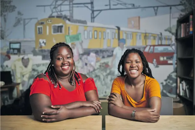  ?? Photo: Thom Pierce/the Actionists ?? Dudu Xaba and Mbali Khumalo are members of the Young Urban Women group.