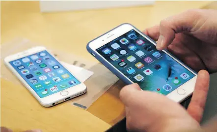  ?? — AP FILES ?? Among the counterfei­t goods the Canada Border Services Agency has seized since 2015 have been 900 fake iPhones. That’s the year the agency got the power to detain suspected fake goods.